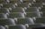 Rows of empty seats in the amphitheater.