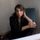 Lara Downes Lara Downes dressed in black and sitting in a chair.