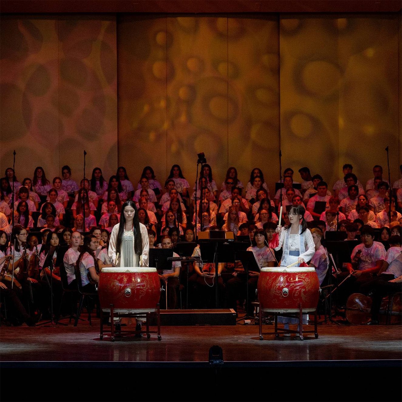 students performing on drums at the festival of young artists
